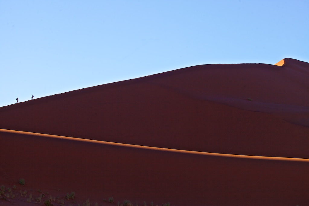 Climbing the 385-metre "Big Daddy" sand dune. Sossusvlei, Namibia.