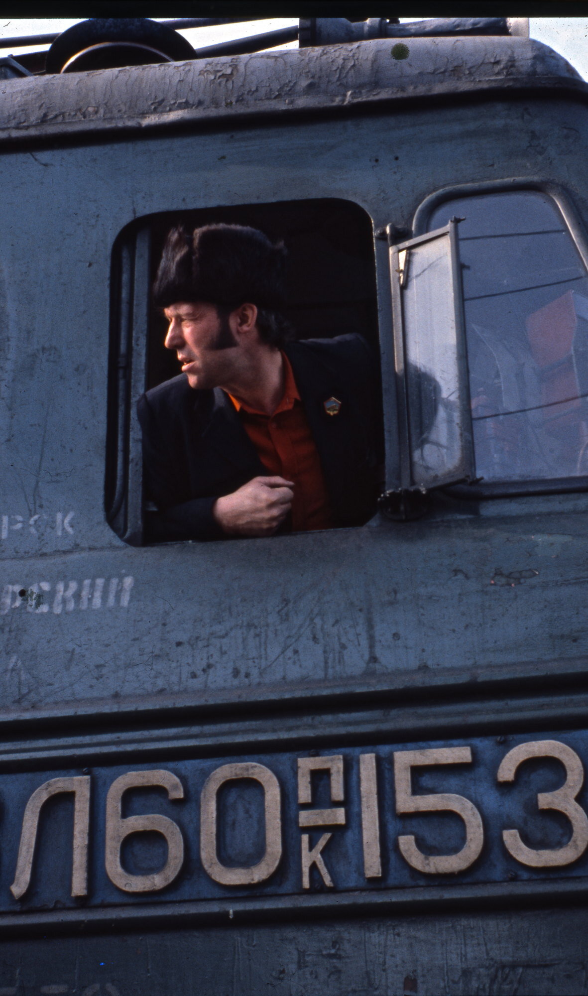The driver of a Trans-siberian train. The trip from either Vladivistok or Beijing to Moscow takes four days with lots of birch trees for scenery and and an increasing longing for good food. Russia.