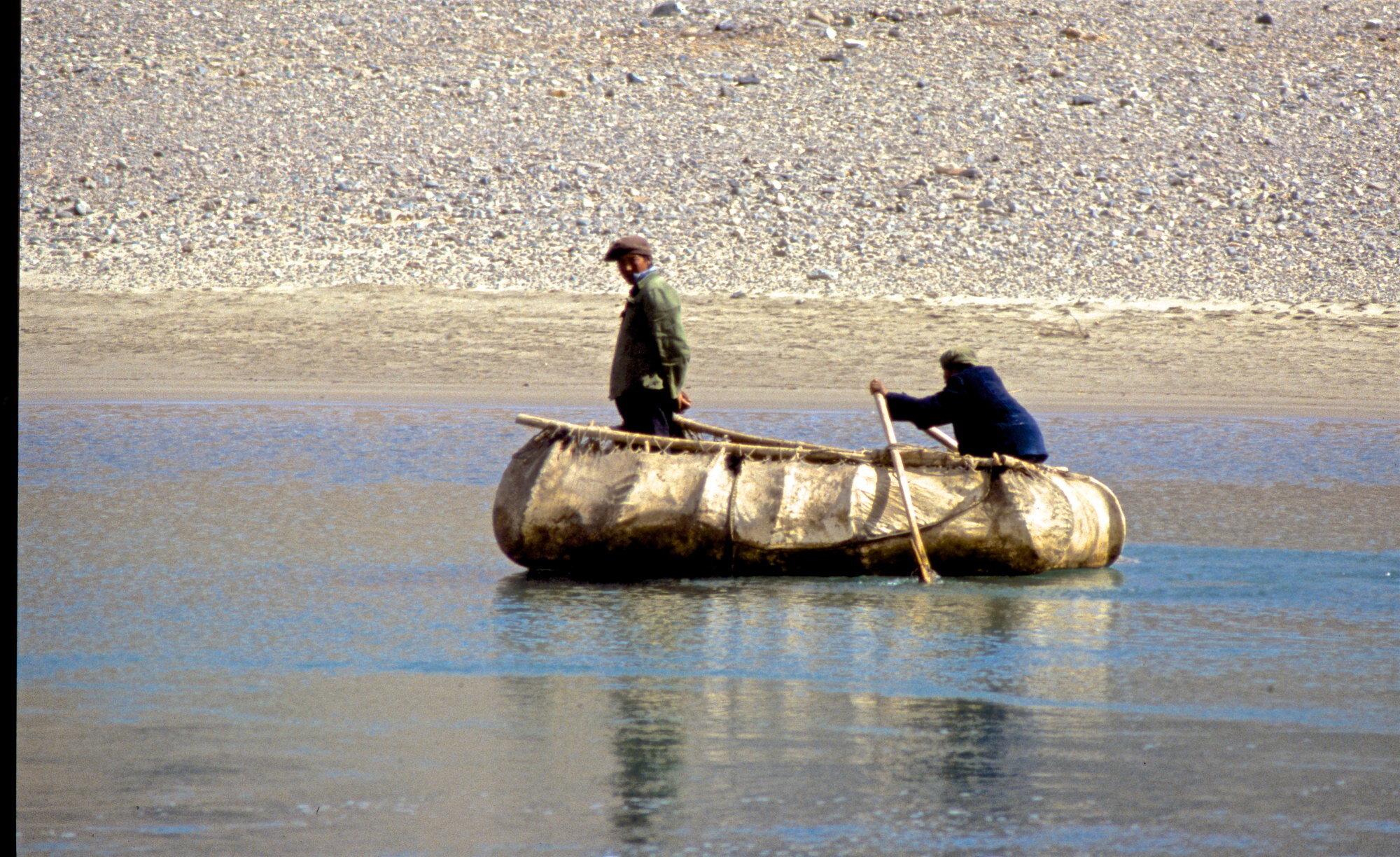 Light enough for one man to carry: a rowboat made of yak hide. Tibet.