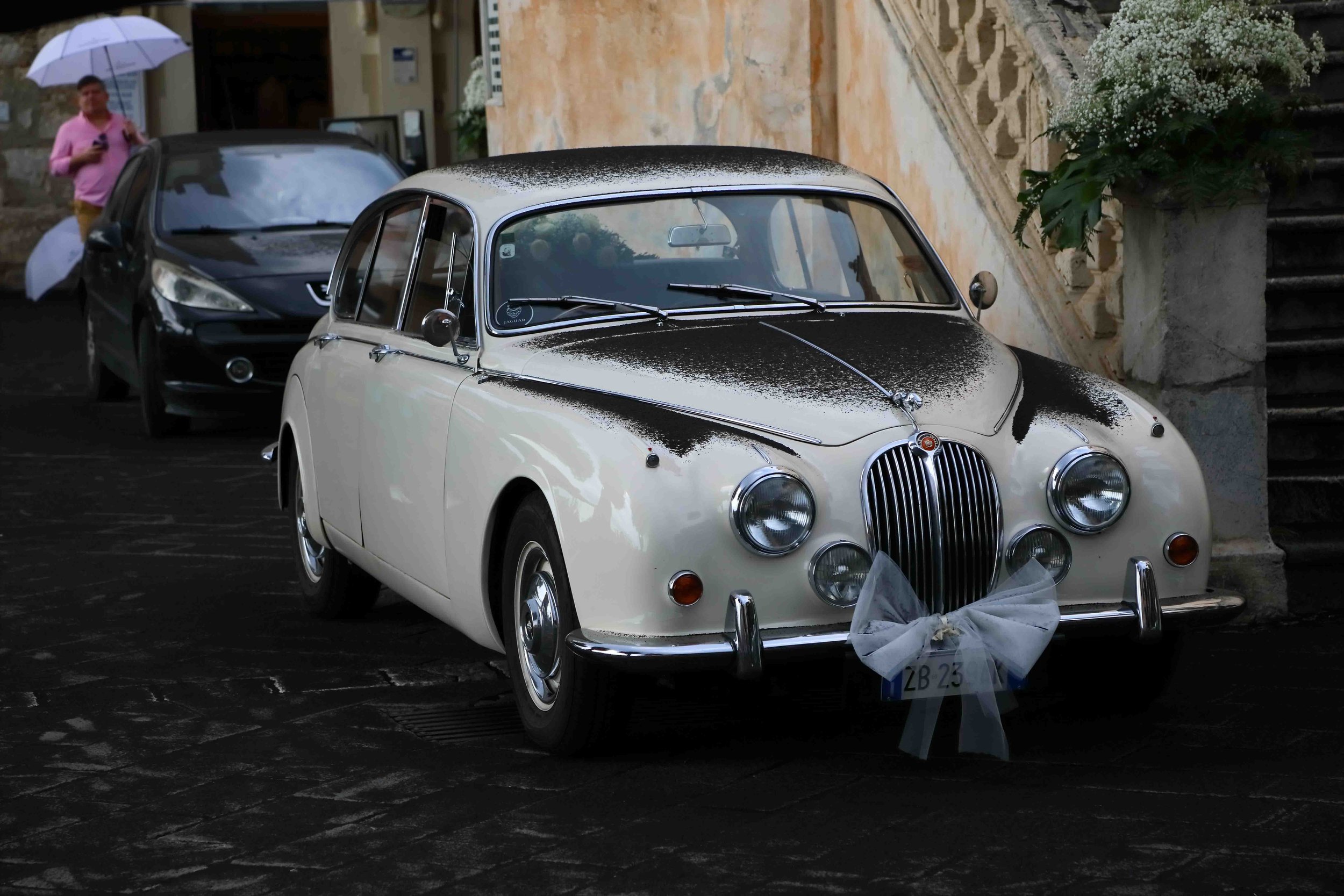 Wedding preparations rudely interrupted by lava raining from Mount Etna, Sicily, Italy.