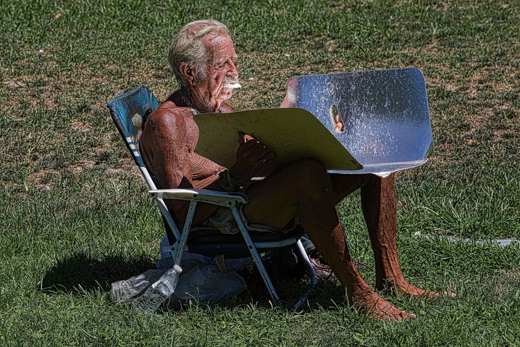 Sun lover, Washington Square, NYC.