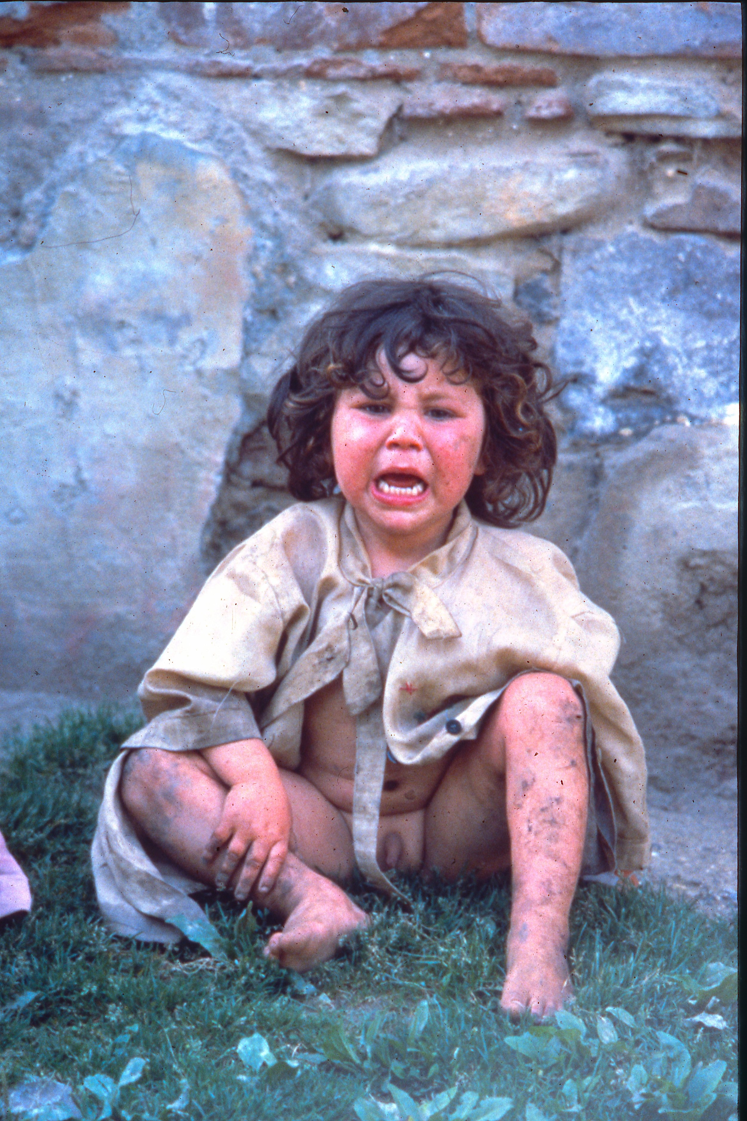 Young boy in Romania feeling abandoned.