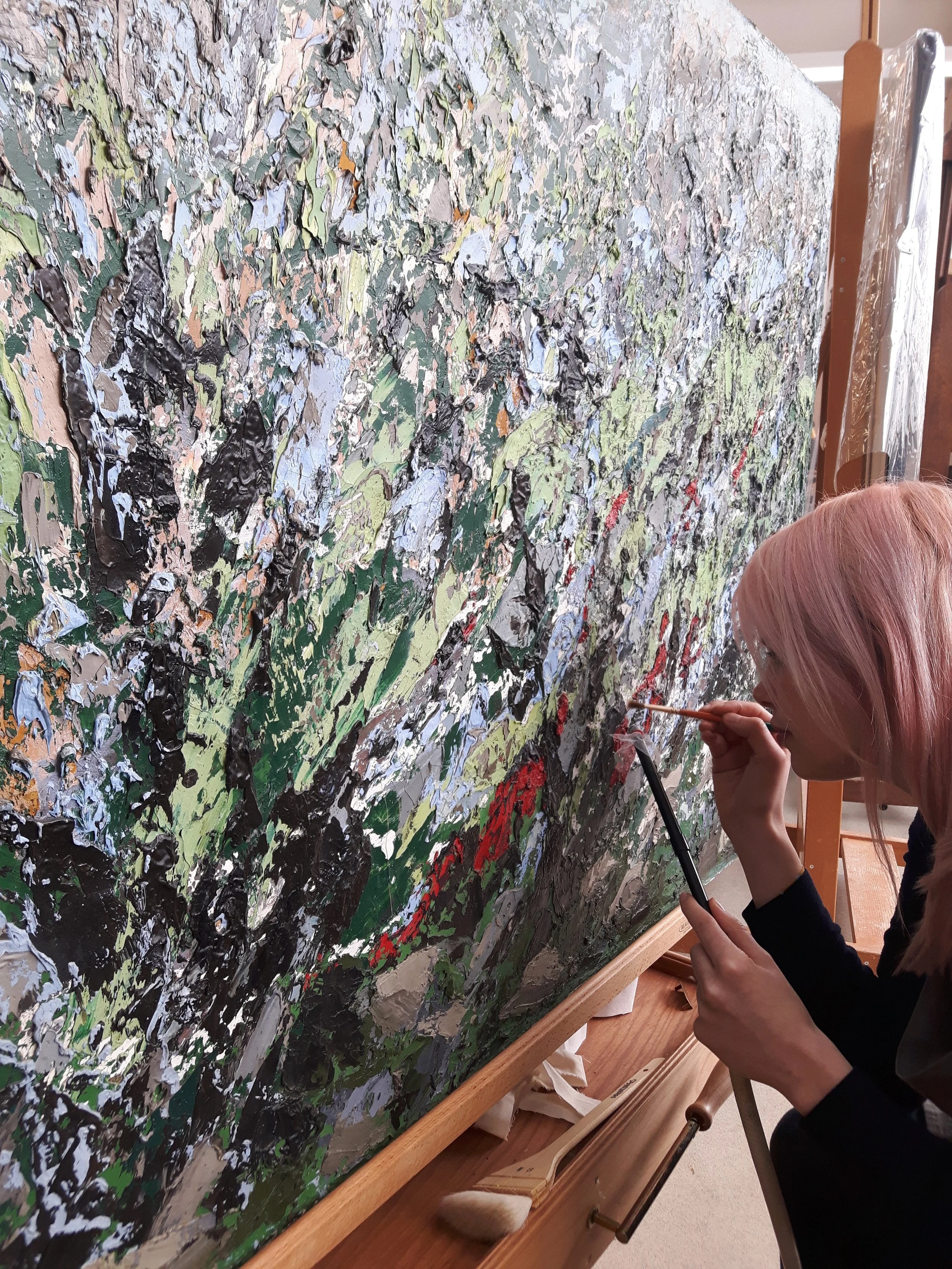 DURING TREATMENT: dry cleaning of high impasto surface, natural lighting