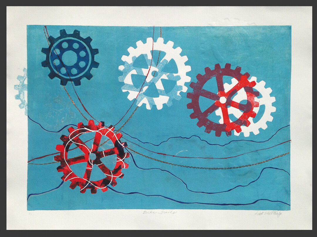    Bike Trails   is a mixed media monoprint In the first run the plate was inked, wiped, and inked again with a slightly darker color, gears were placed on the plate surface in order to leave a white image and the plate was run through the press. On 