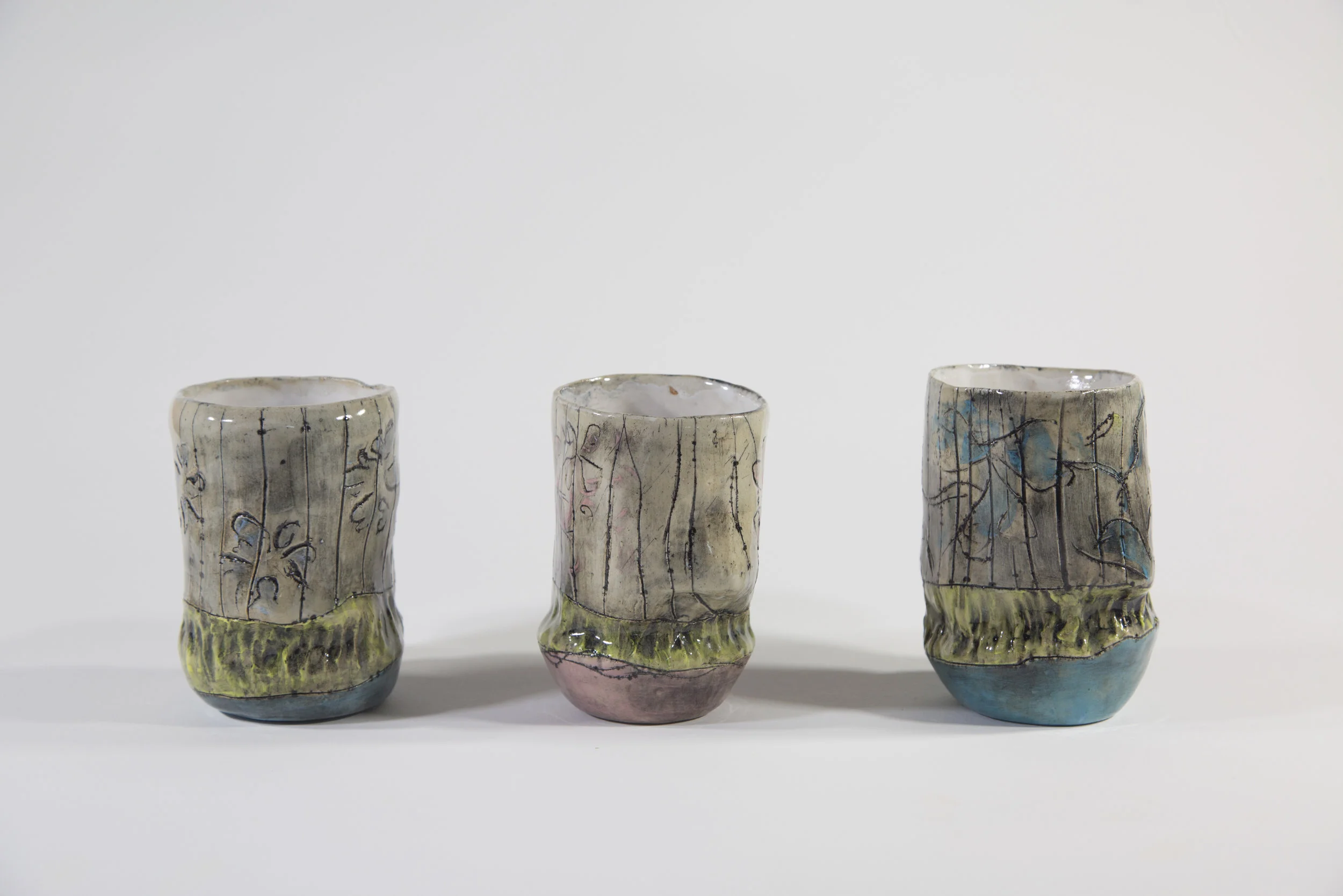 Tricolor Cup Series 2018 Glazed ceramic cup in middle: 4”h x 4.5”w x 10”d