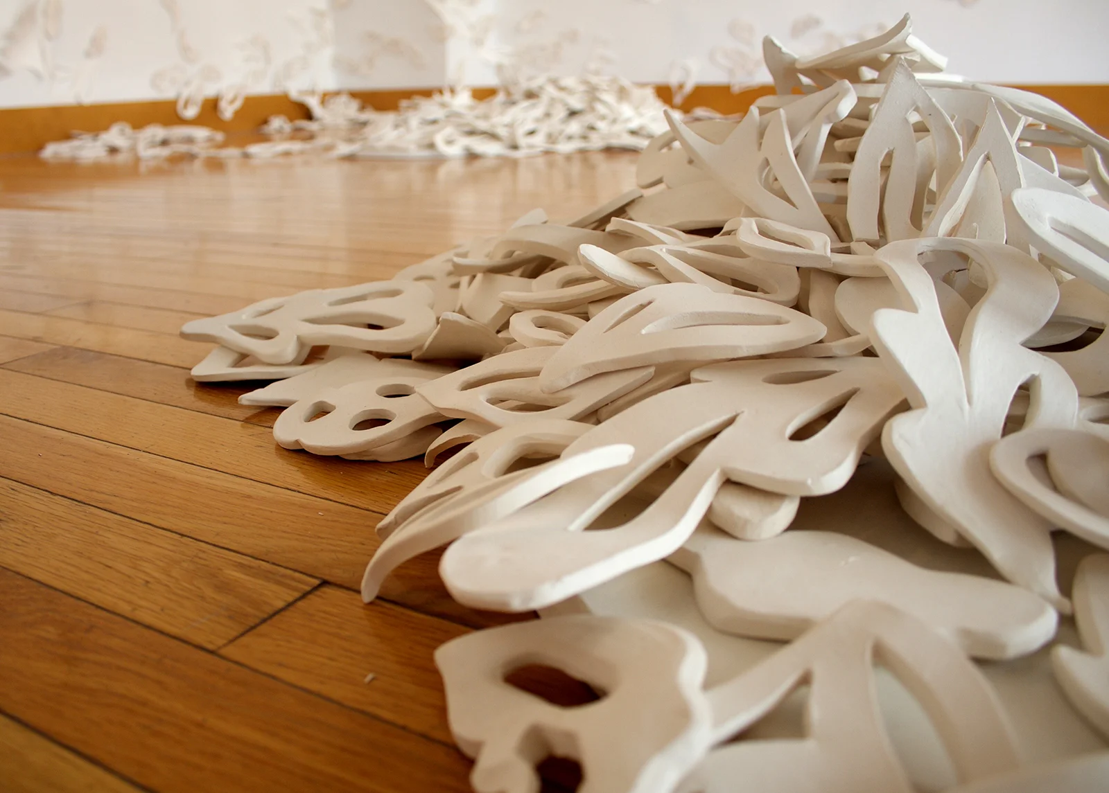 Haven, Installation Shot Kranzberg Arts Center, Fall 2016 Unglazed white earthenware, watercolor paper, fishing line