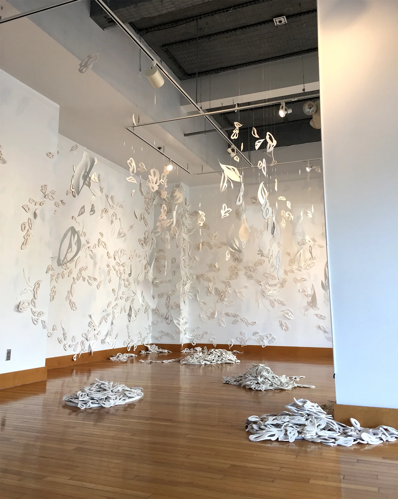 Haven, Installation Shot Kranzberg Arts Center, Fall 2016 Unglazed white earthenware, watercolor paper, fishing line