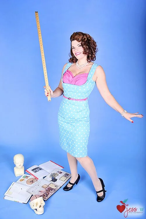 Sinthia Sterling- Potential Photo by Jess W Photography I am a high school social studies teacher at in Las Vegas, Nevada. My love of history led me to loving all things vintage; including the fashions, hair and lifestyles. As a teacher, wife and mother, I try to be a positive female role model. I believe that is what being a Pin-Up is about. They are smart, independent, strong, confident and secure with themselves, no matter what their race, size or age is. I love helping out active duty and military veterans in our local community and beyond. I also love pinup contests and have been in many local ones. I never go to win, I just go to make new friends and have a chance to get all dolled up and strut on stage. I think Jane Mansfield said it best “when I’m 100 I’ll still do Pin-ups and I like being a pin up girl… there’s nothing wrong with it!” It is women like her that inspire me to continue to be a positive force in the world and to also be confident in my own skin. https://www.facebook.com/Sinthia-Sterling-1568888706719591/