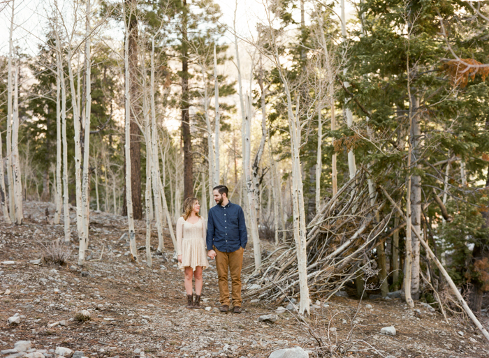 wooded teepee in the forest engagement session