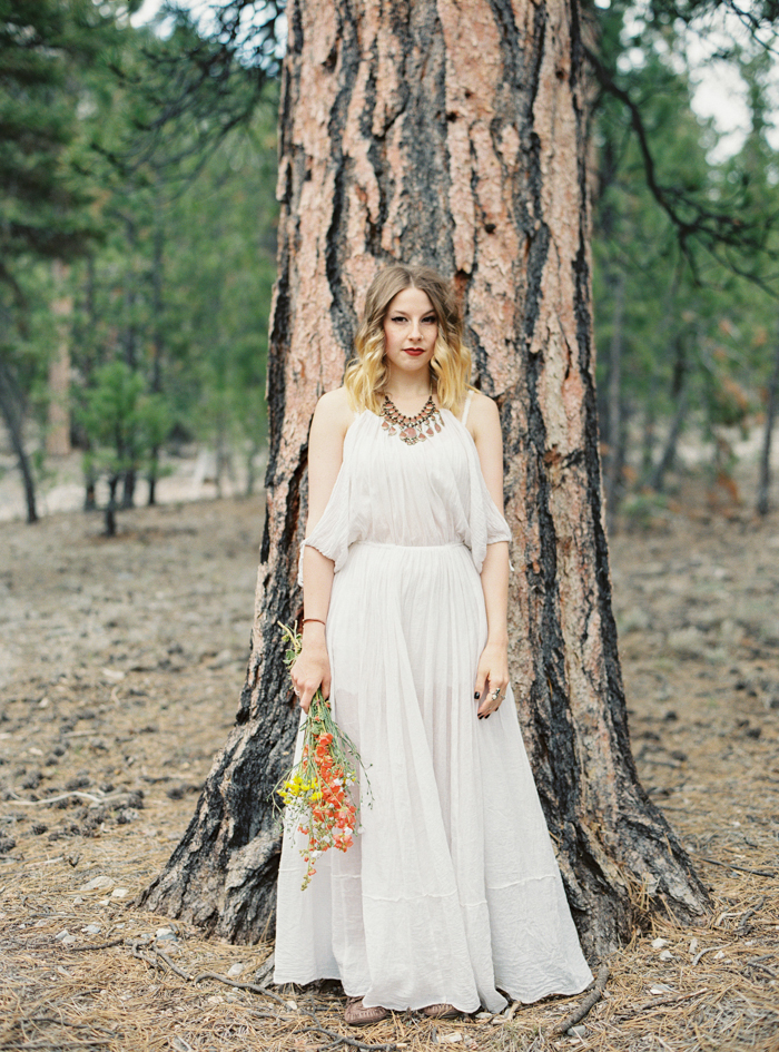 boho free people engagement dress in the forest