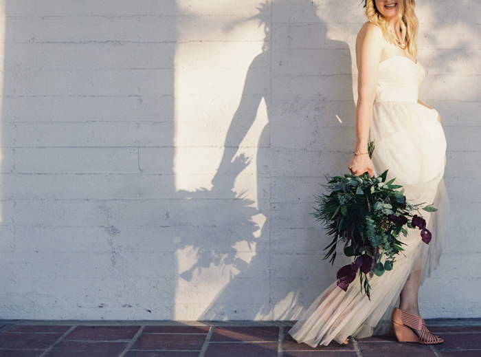 bhldn wedding dress and eucalyptus bouquet