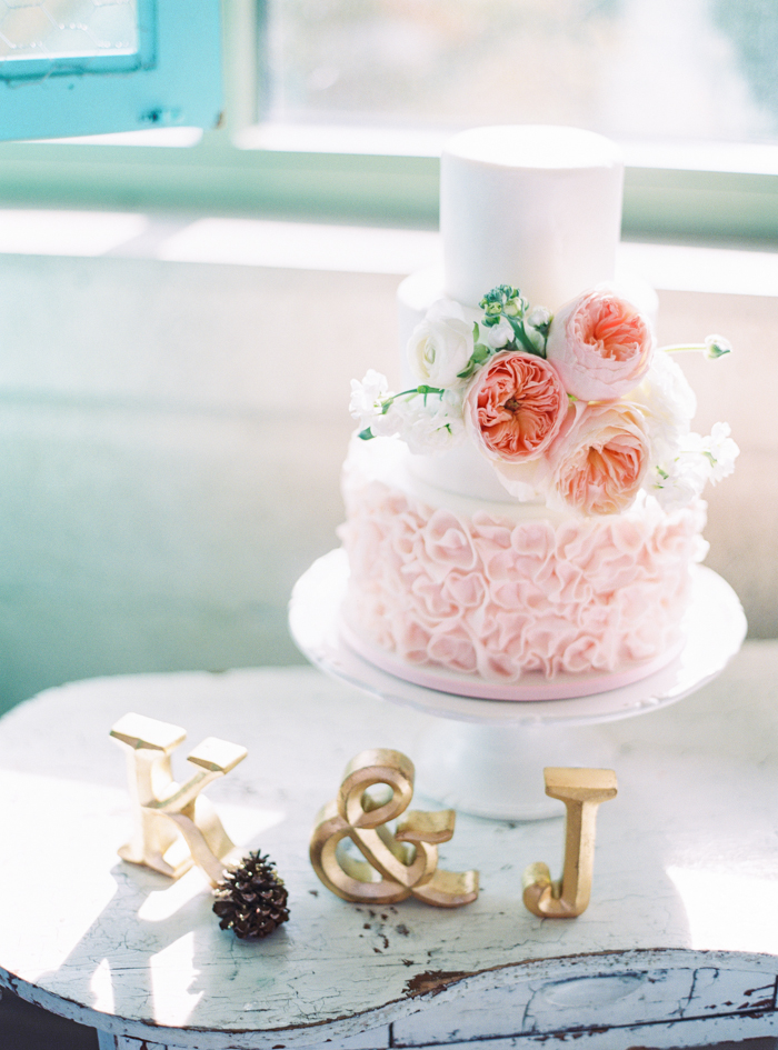 ruffled layers pink peonies wedding cake by Peridot Sweets