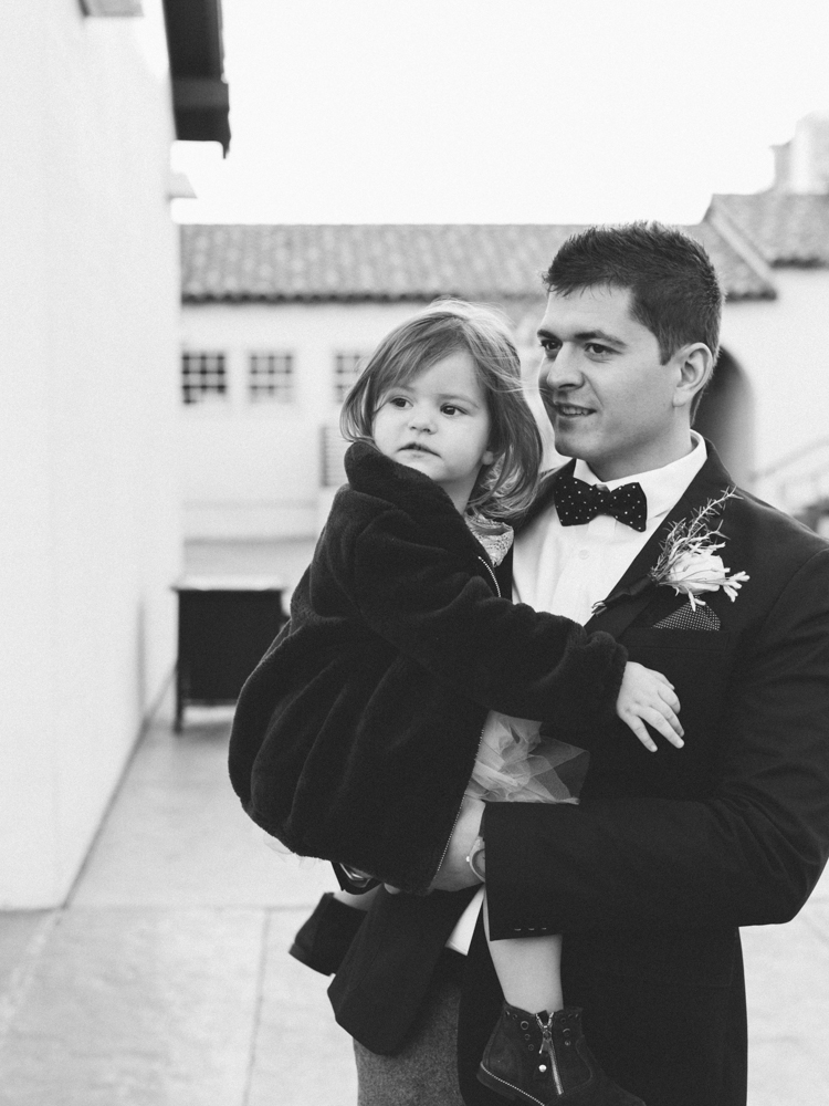 historic fifth street school wedding | gaby j photography | las vegas wedding photographer | family gathering winter wedding inspiration | dad holding daughter