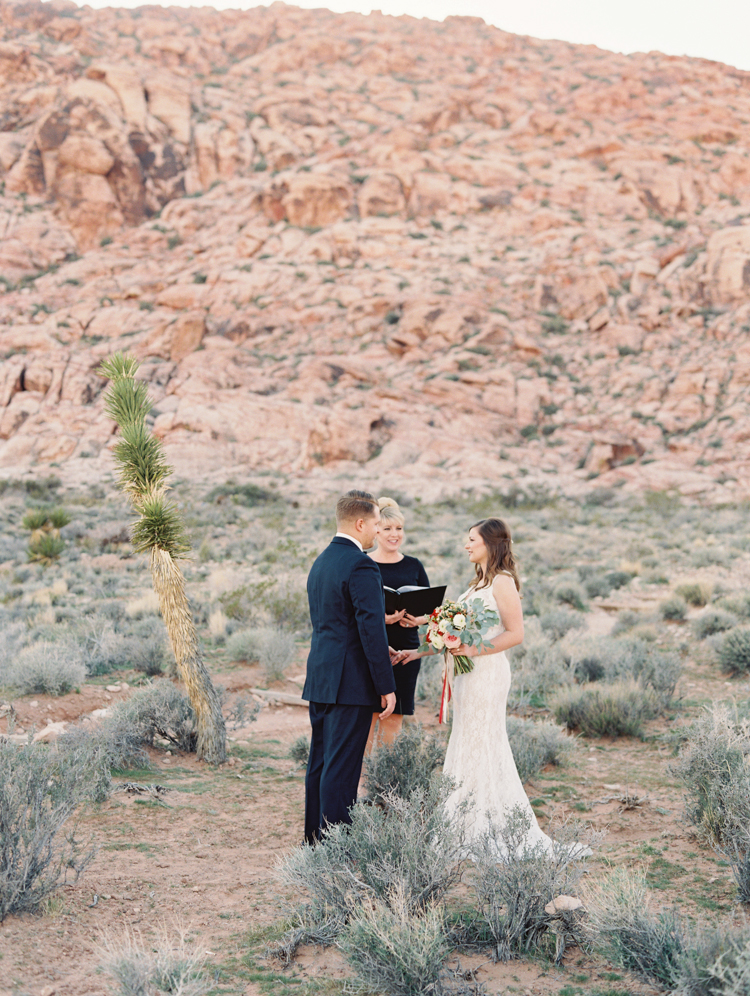 small wedding at red rock canyon national park | desert elopement | gaby j photography | las vegas elopement | danani handmade adornments | opal floral | peachy keen unions