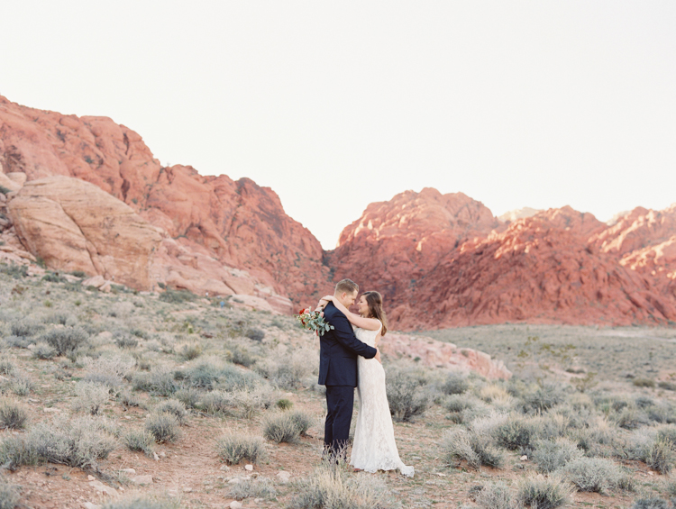 small wedding at red rock canyon national park | desert elopement | gaby j photography | las vegas elopement | danani handmade adornments | opal floral | peachy keen unions