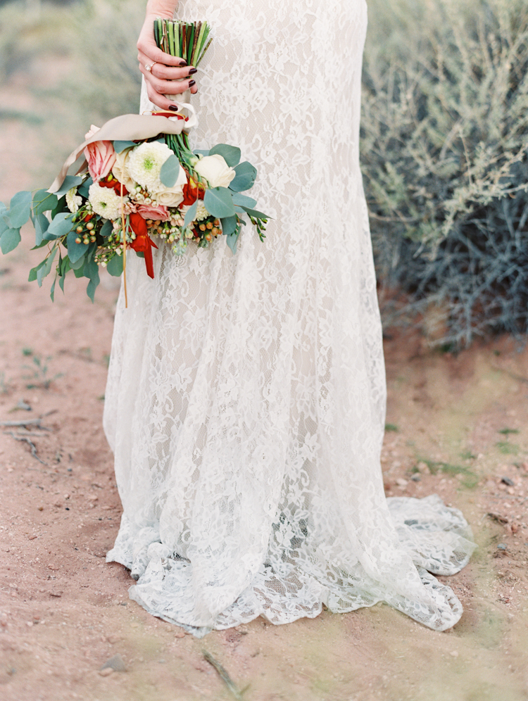 small wedding at red rock canyon national park | desert elopement | gaby j photography | las vegas elopement | dreamnette bridal | badgley mischka | opal floral las vegas