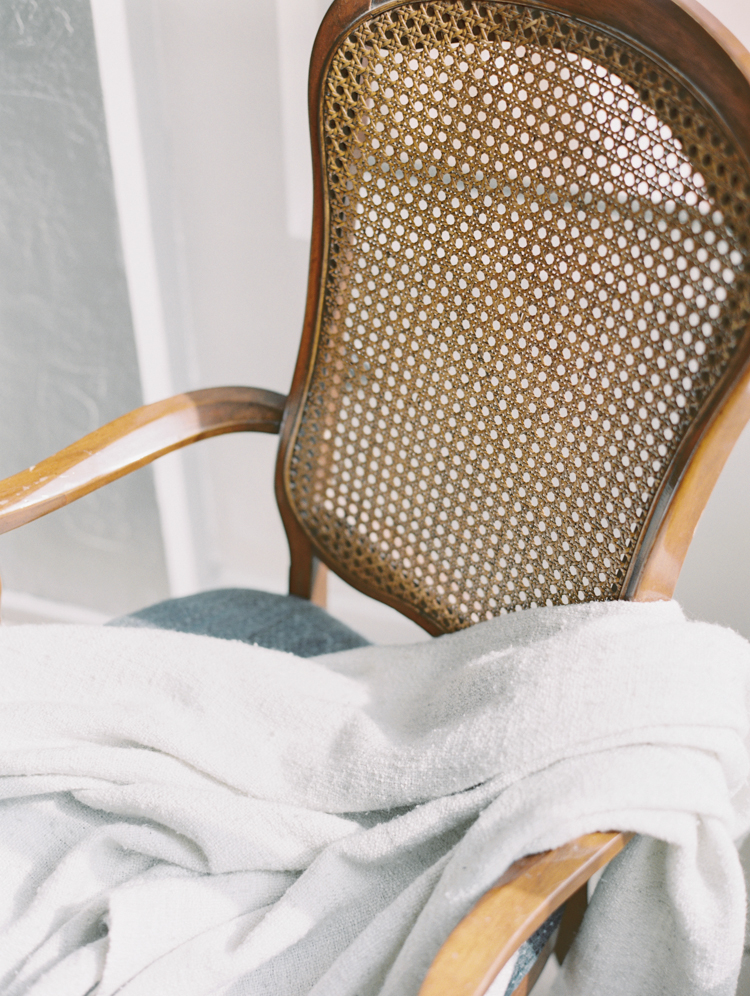 vintage chair and white linen blanket