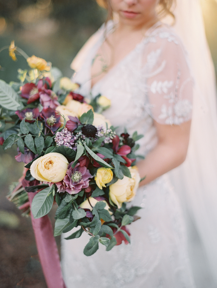 english garden inspired wedding bouquet magentas purples yellows