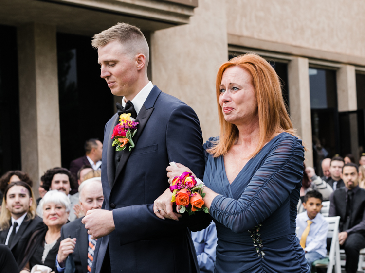mom giving her son away wedding ceremony