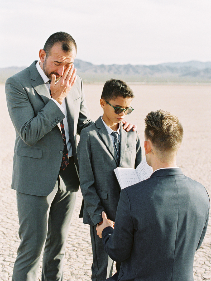 groom saying vows to step-son during wedding ceremony