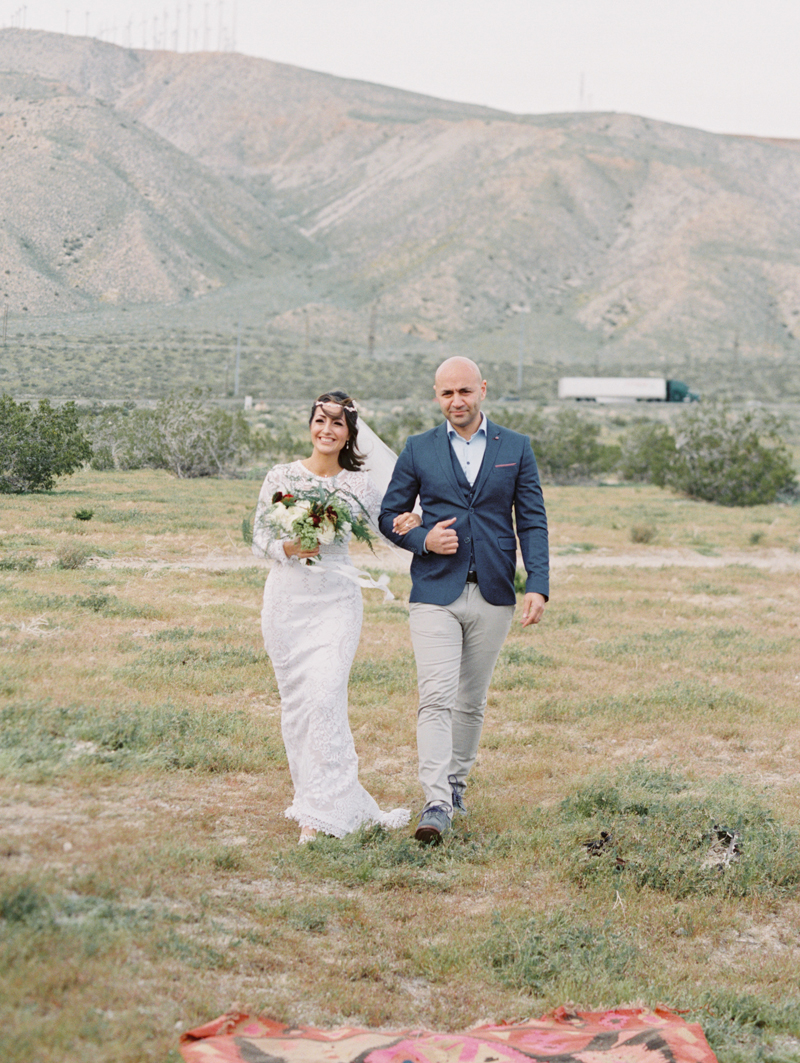 brother walking sister down aisle