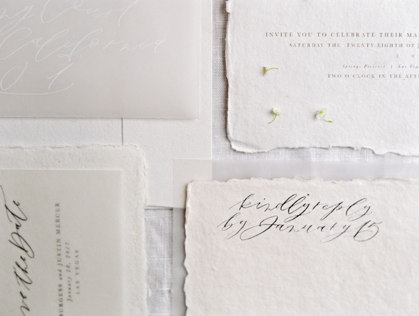 white on white wedding invitation calligraphy