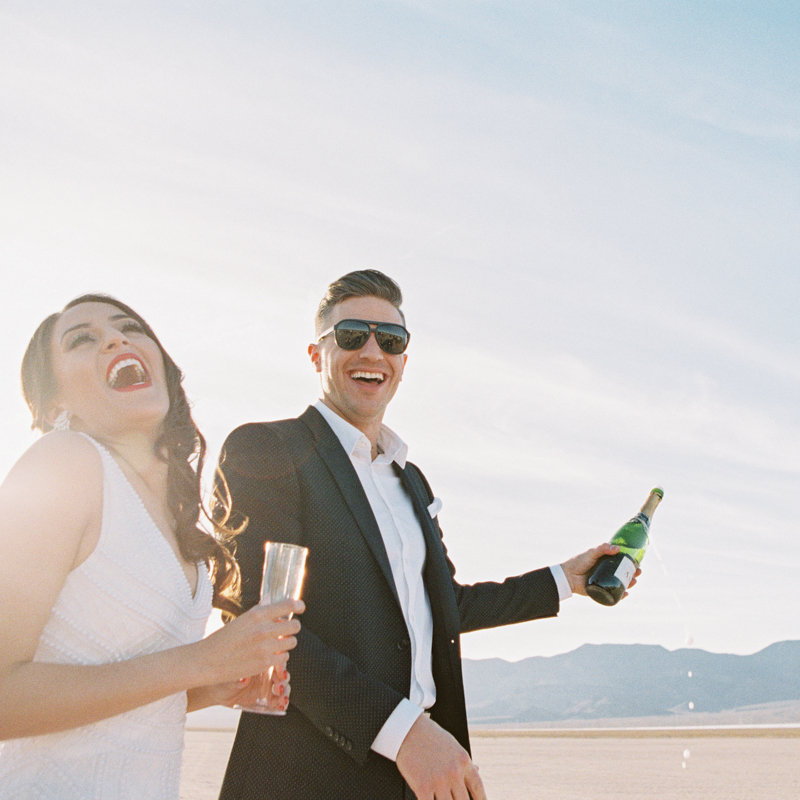 shaking champagne during wedding