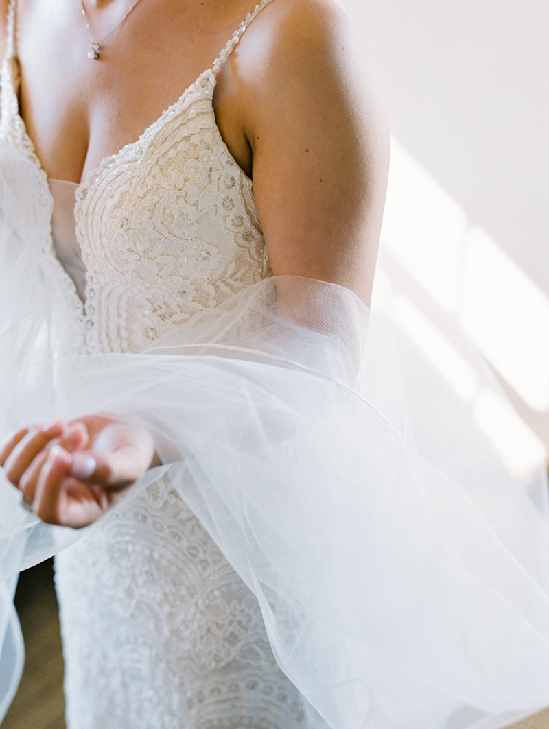 bride holding veil