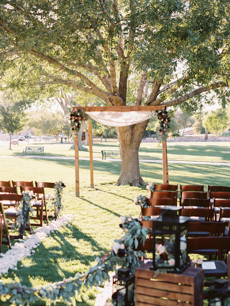 DIY wedding ceremony arch with flowers