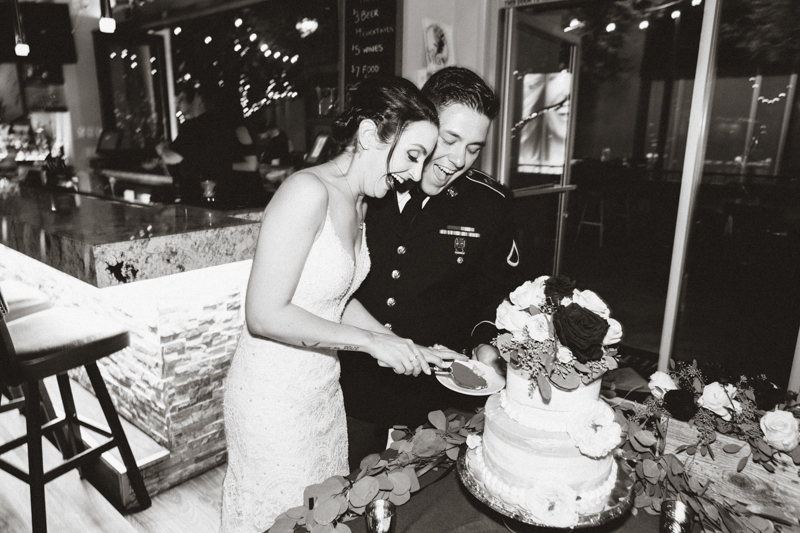 bride and groom cutting the cake