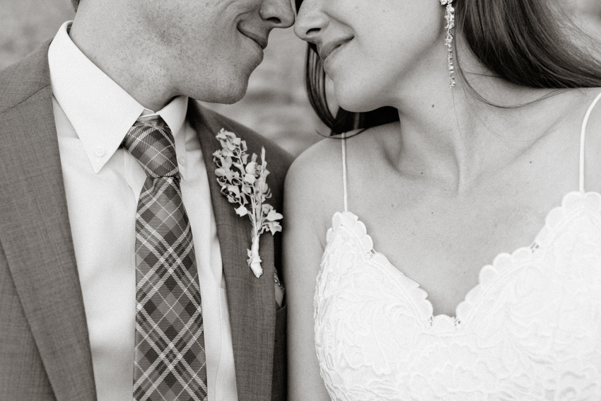 bride and groom share intimate moment together