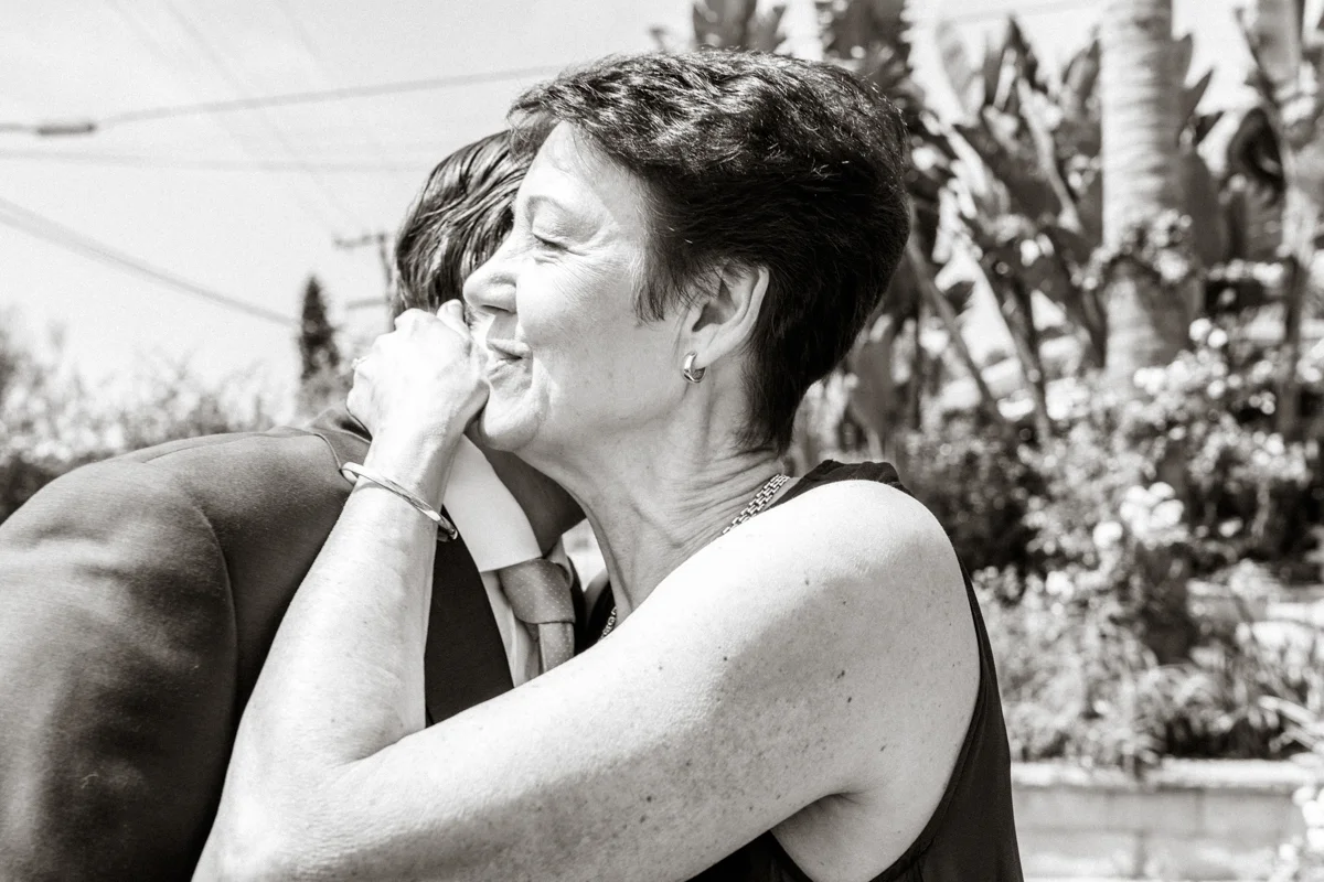 groom and mom having a moment