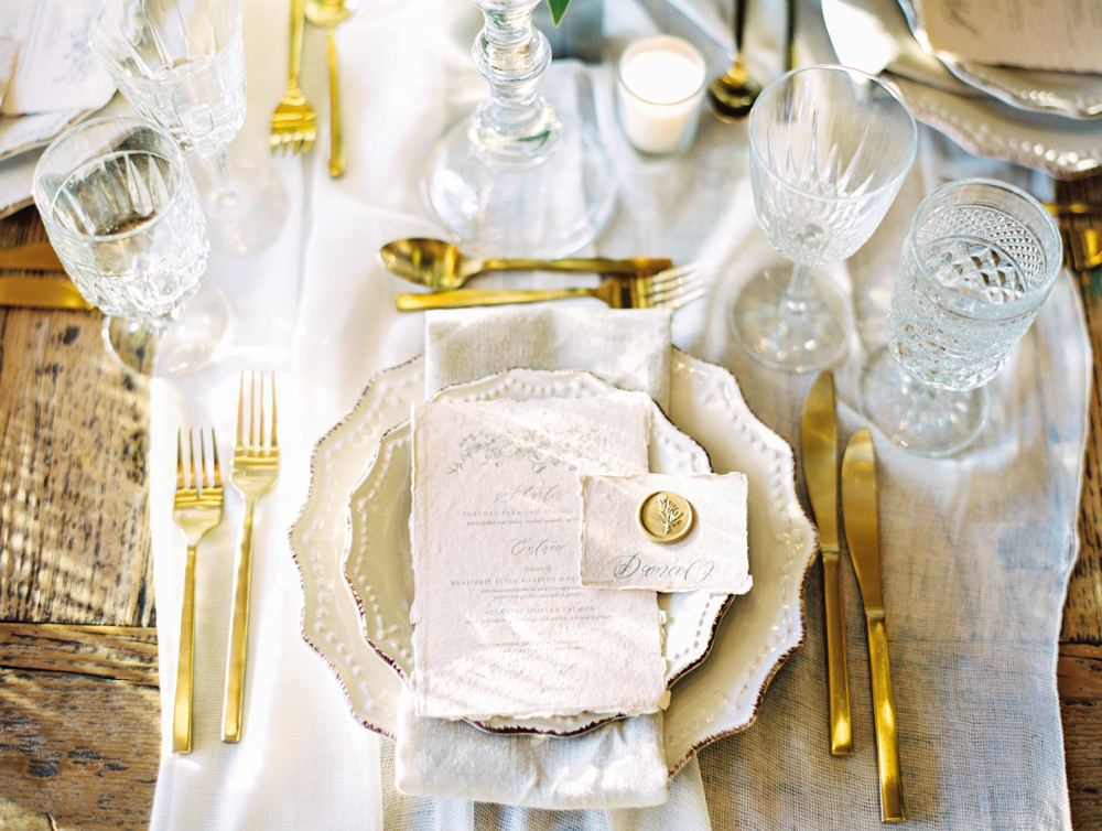 romantic wedding reception wedding reception tabletop gold flatware and dinnerware