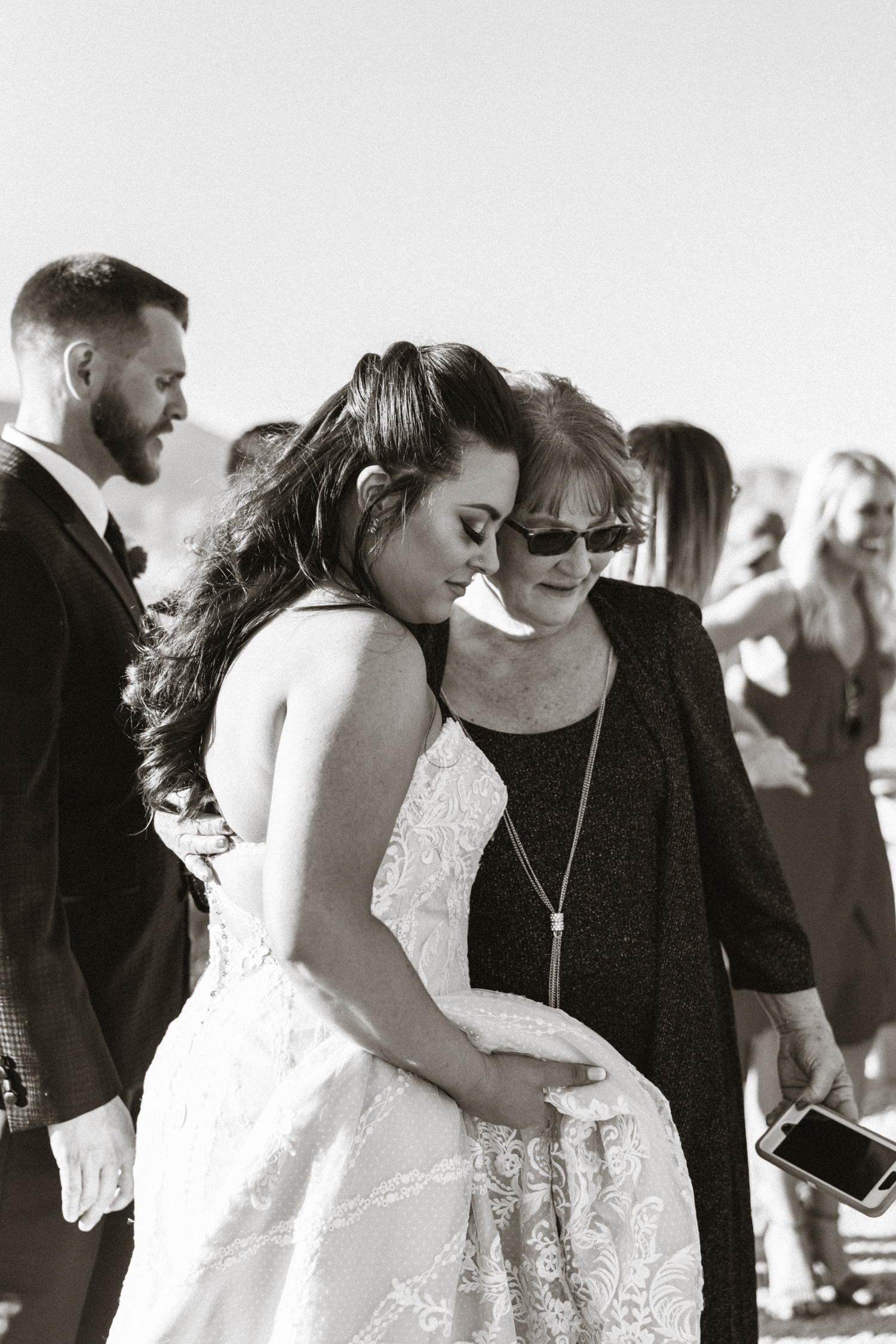 bride sharing a tender moment with her mother