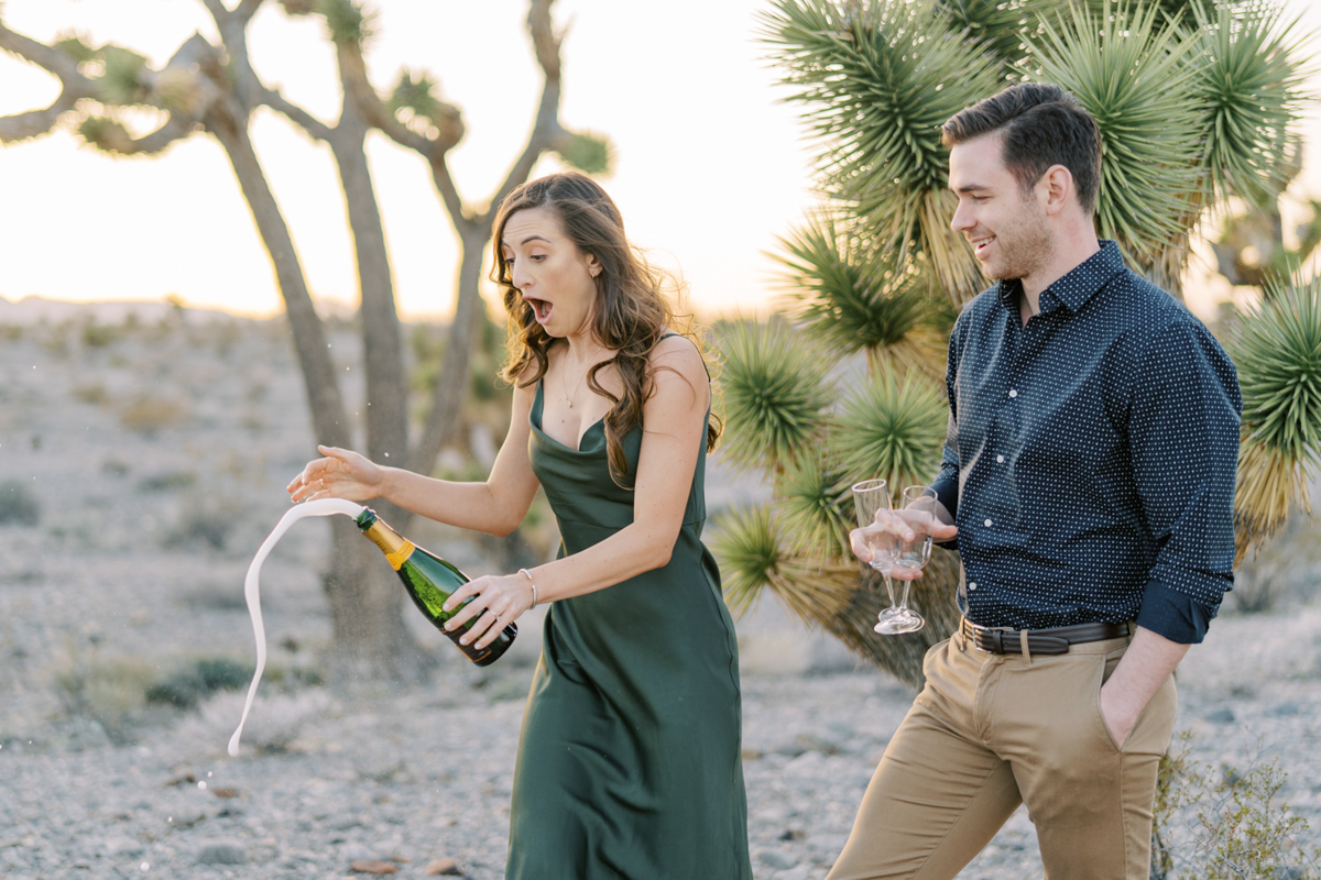 engagement photos with champagne