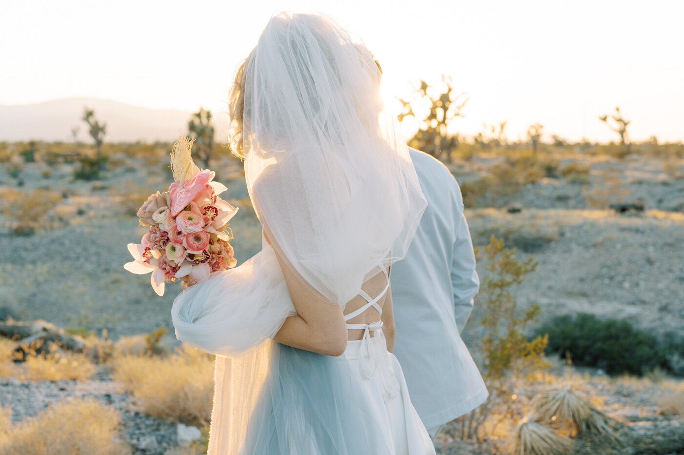 bride wearing blue ombre veil