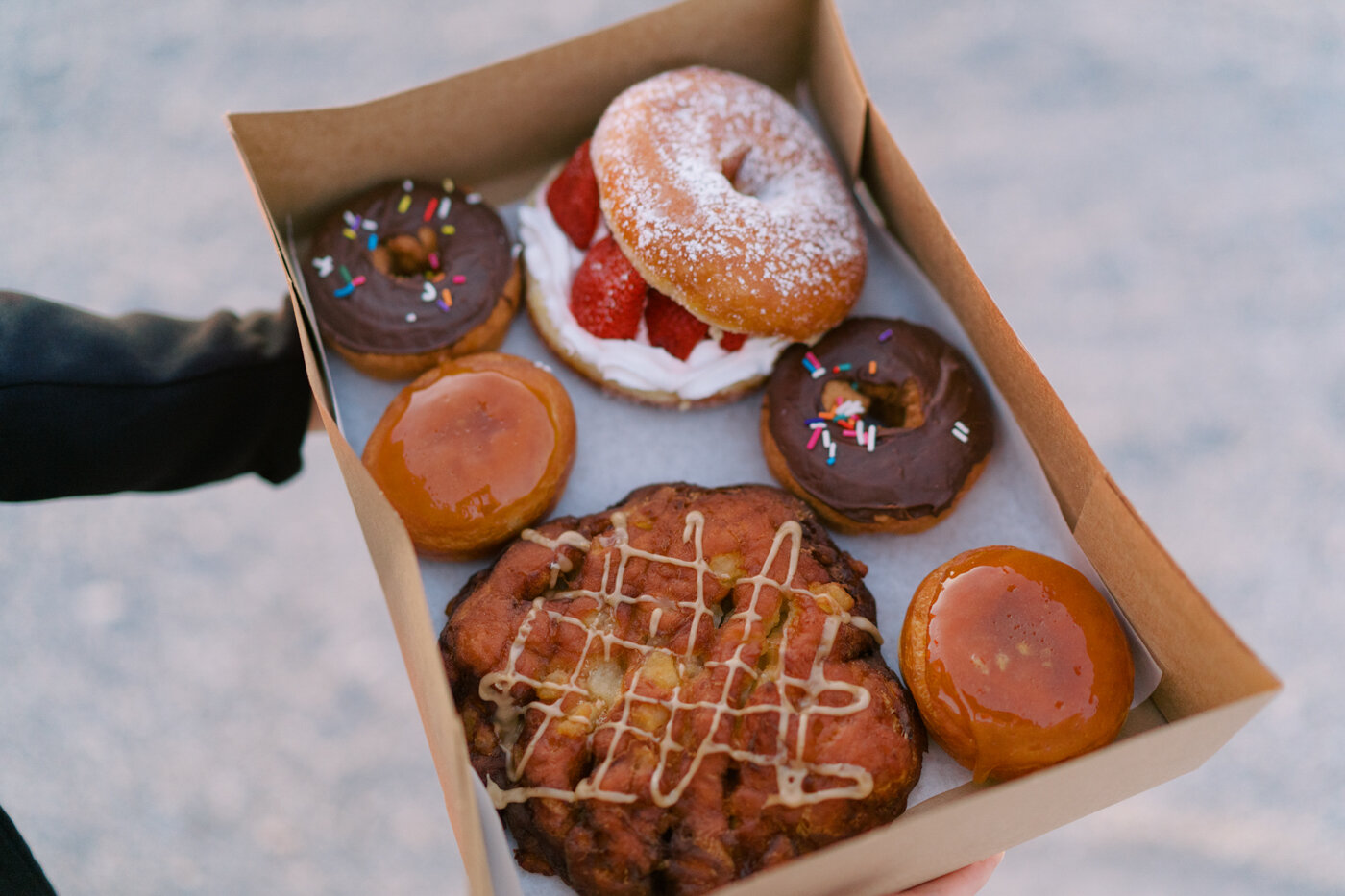 eating donuts during wedding reception