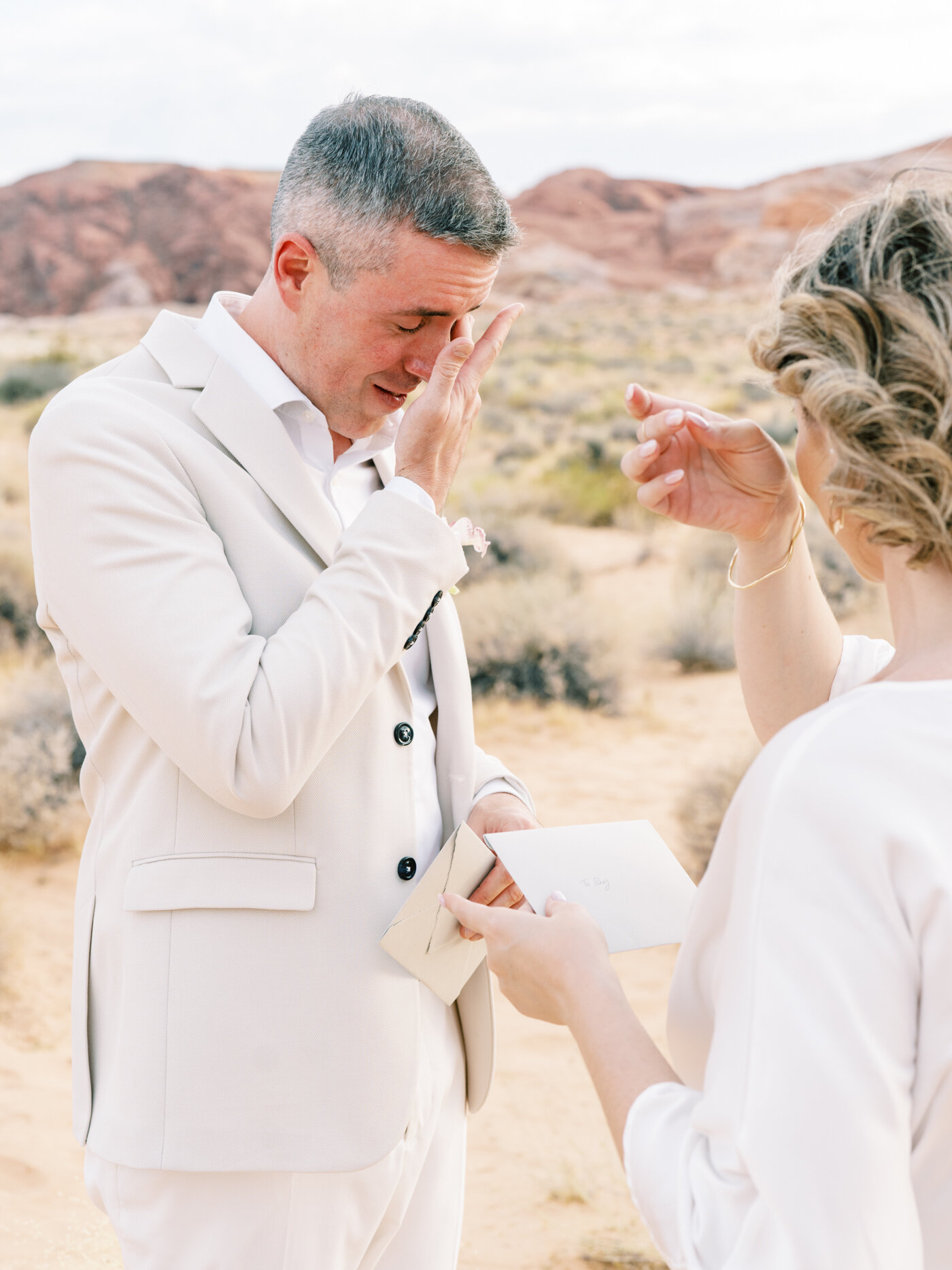 groom crying during ceremony