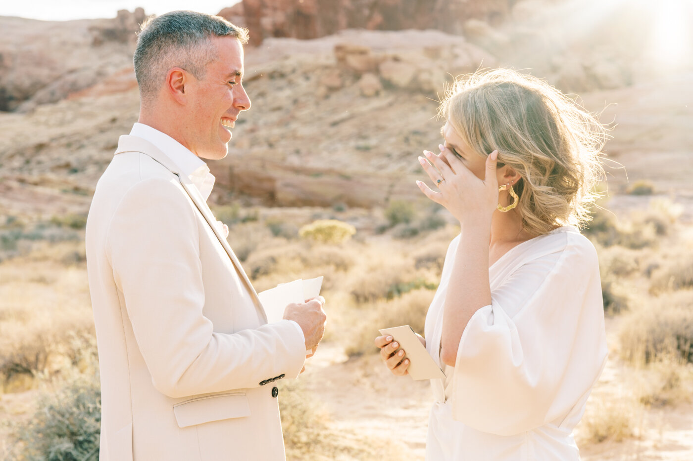 bride and groom crying during vows