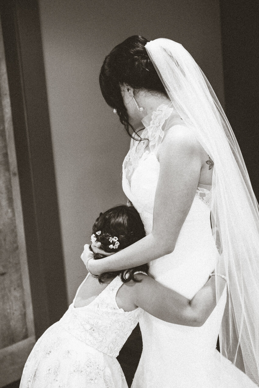 bride and daughter hugging
