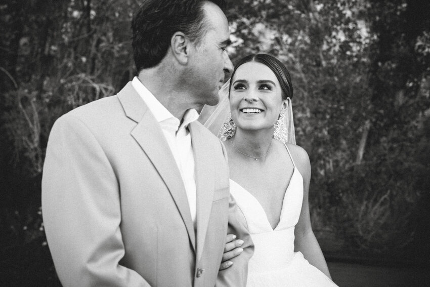 dad walking daughter down aisle