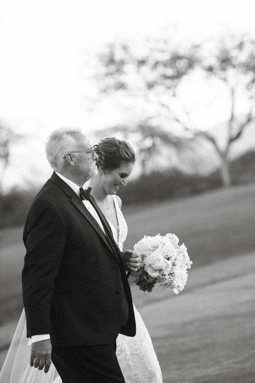 brides dad walking daughter down the aisle