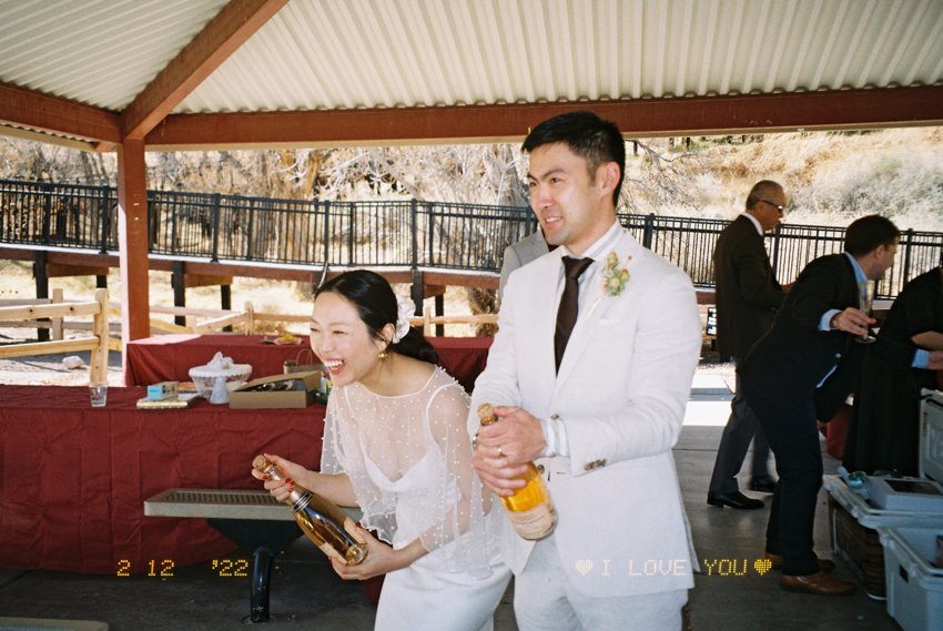 red spring boardwalk picnic wedding