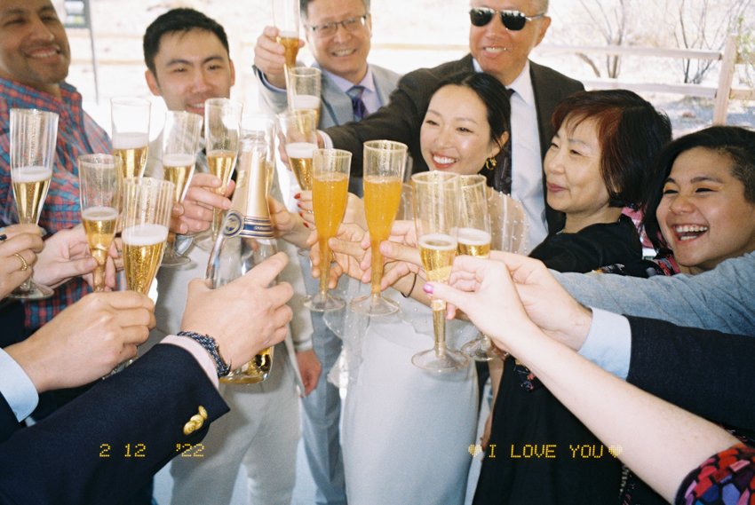 bridal party cheers mimosas