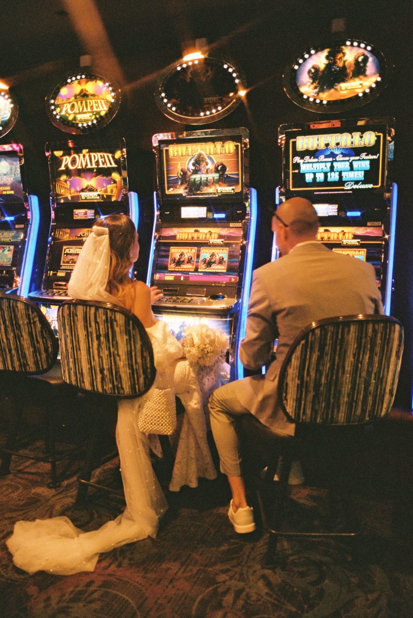 bride and groom in vegas casino