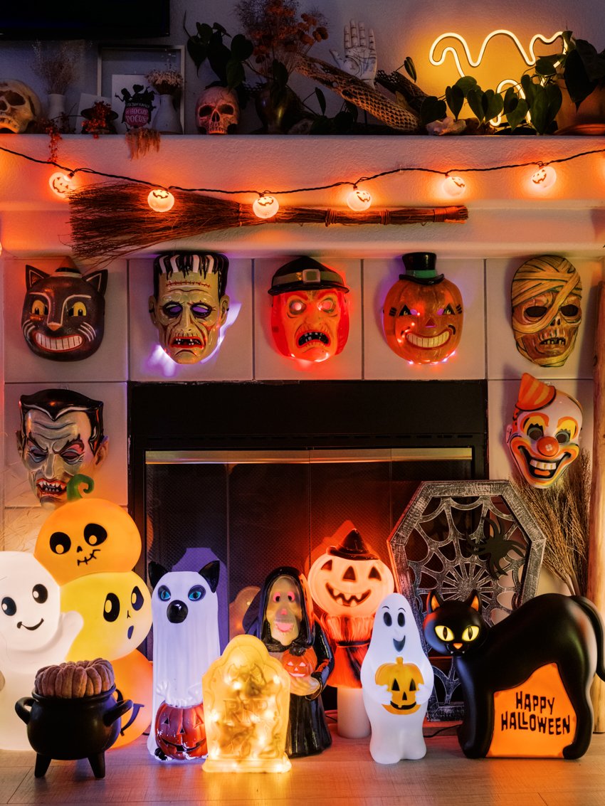 vintage halloween masks on wall