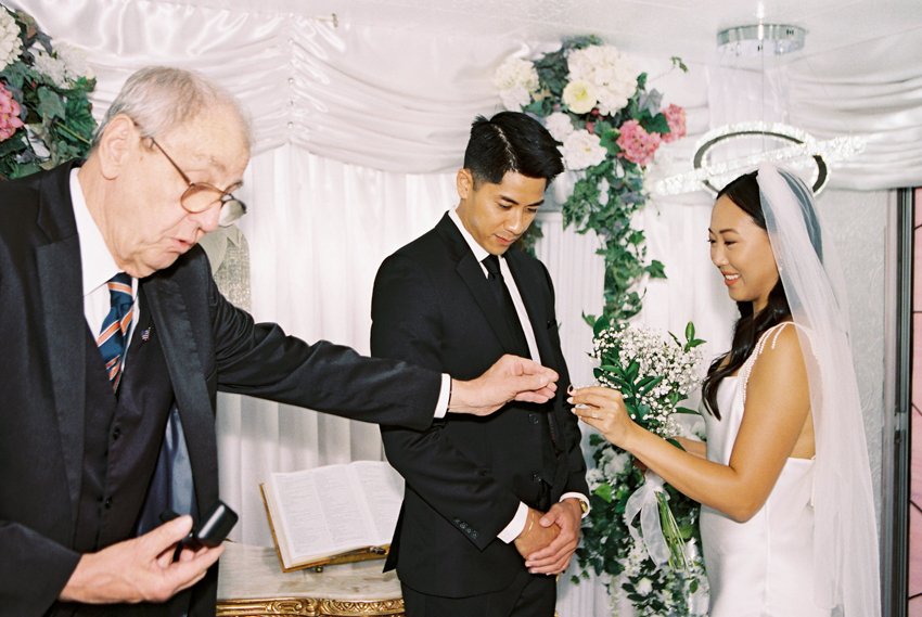 inside little white wedding chapel ceremony