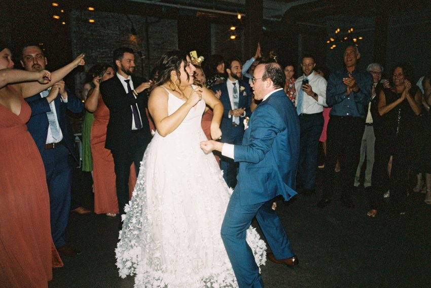 bride and groom dancing 35mm