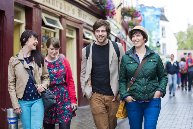 small-A group strolling through High Street in Galway city.jpg