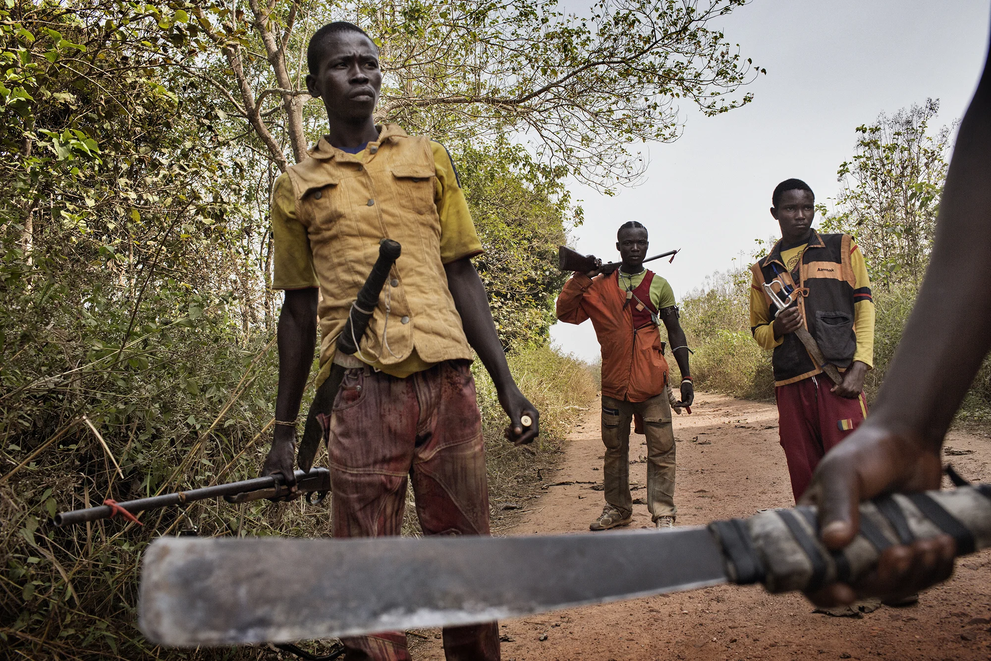 Anti Balaka on the road to Boda. They are going there to attack the Muslim residents who remain there. Previous the Muslims were protected by the Seleka but they fled leaving the civilians to their fate. Over 40 Muslims have been killed in the town in 5 days and nearly 50 Christians.